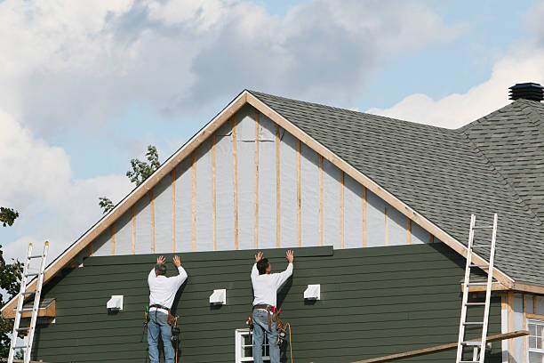 Professional Emergency Siding Repair technician working in Dawson, PA